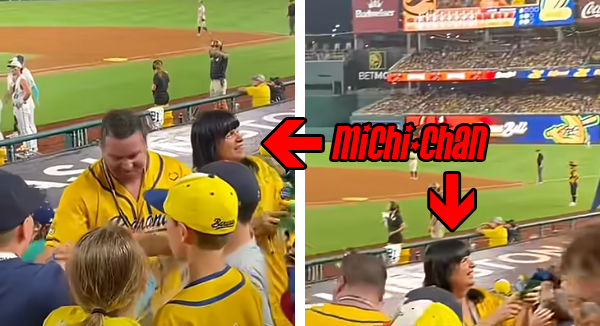 Michi-chan at a Savannah Bananas game passing out plush toys to young fans.